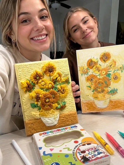 Two customers holding flat and raised sunflower artworks
